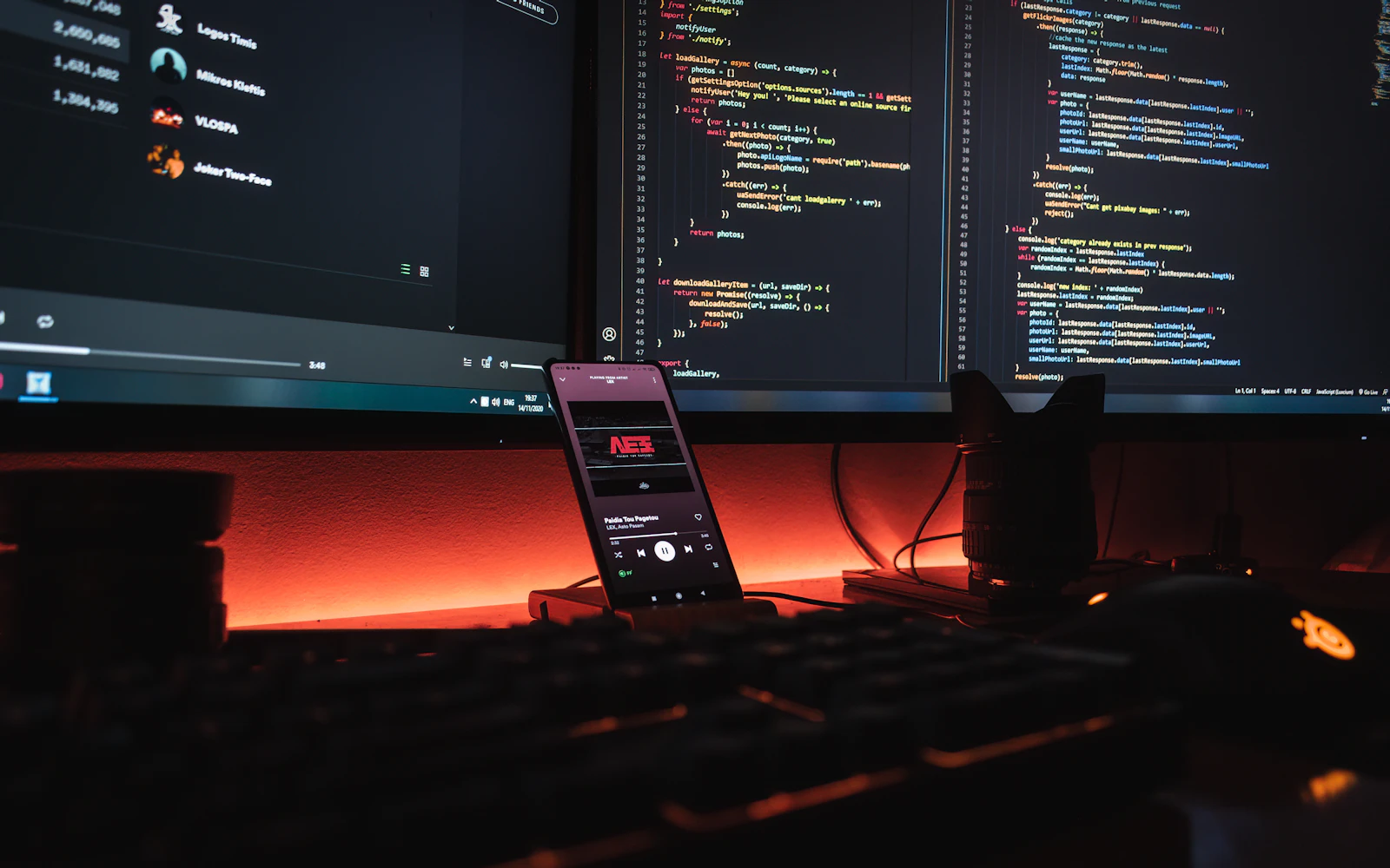 Developer workstation with code on multiple monitors